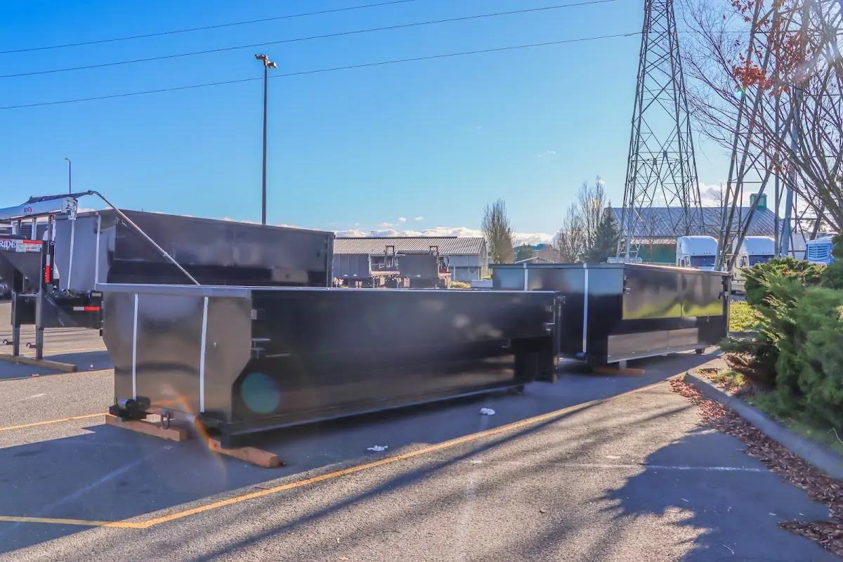 Roll-off dumpster ready for waste disposal at job site for Construction Dumpster Rental in Iowa City